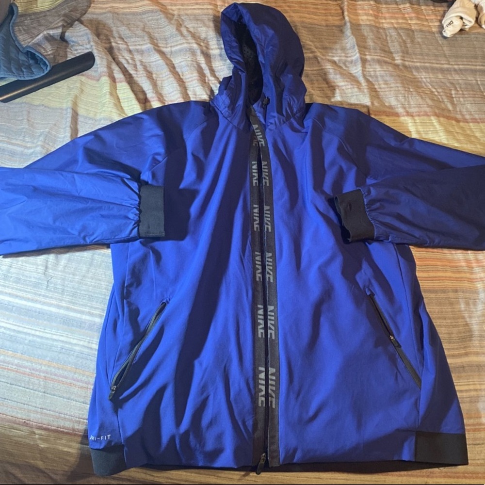 NIKE BLUE LIGHT RAIN JACKET